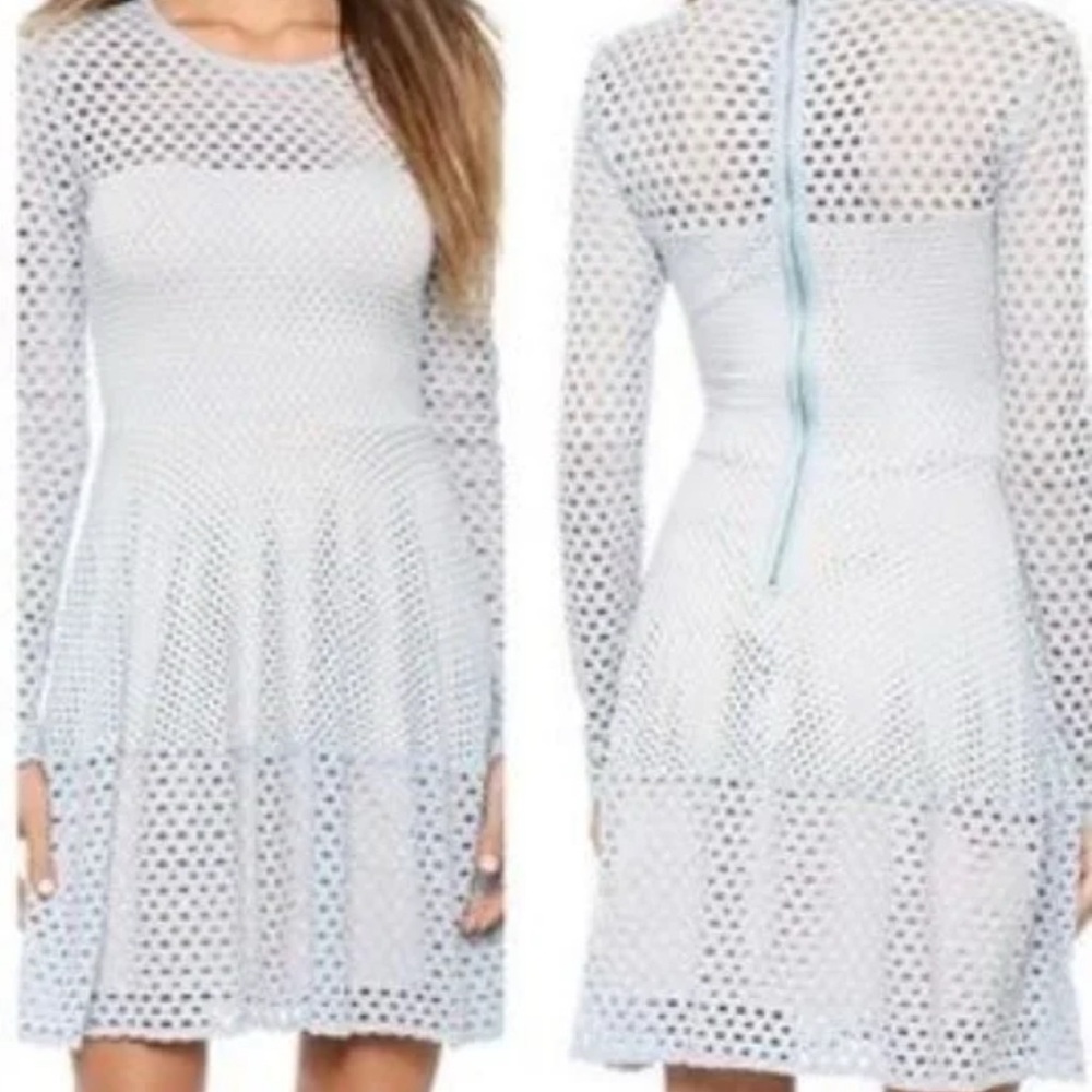 Light grey/ice blue circle cutout pattern on dress